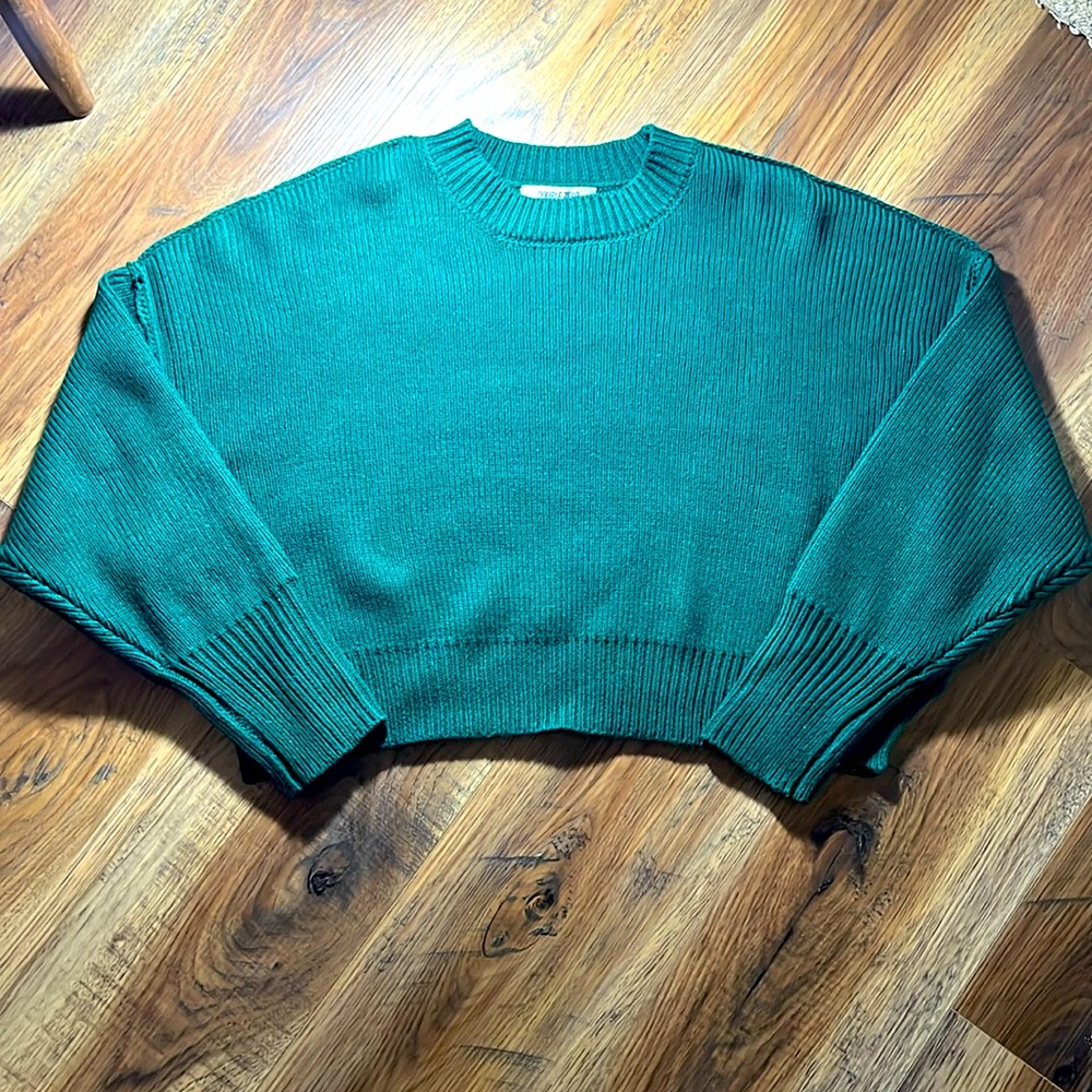 dark green sweater